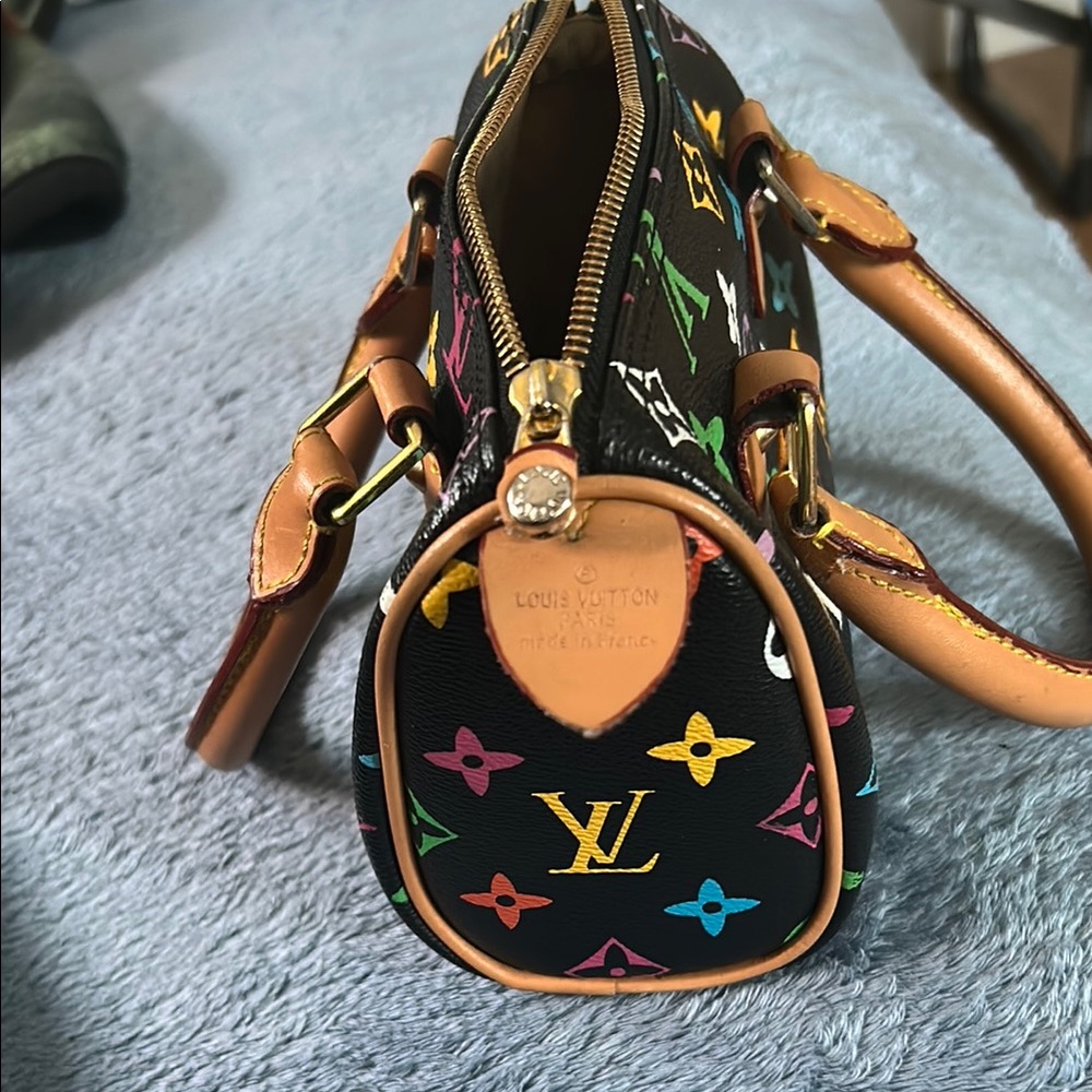 Louis Vuitton Black Mini Bag with Iconic Monogram
